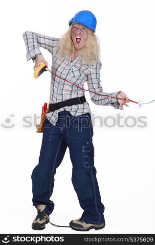 Female electrician getting a shock