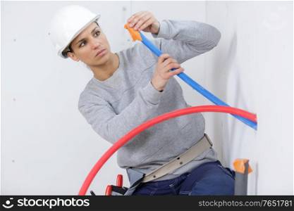 female electrician on construction site