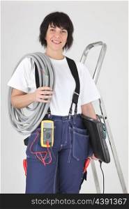 Female electrician ready to work