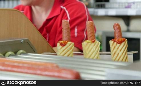 Female employee working in fast food lunch dinner