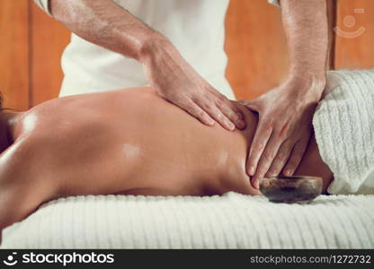 Female Enjoying Relaxing Back Massage In Cosmetology Spa Center