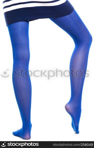 Female fashion. Woman long legs and color blue stockings isolated on white background