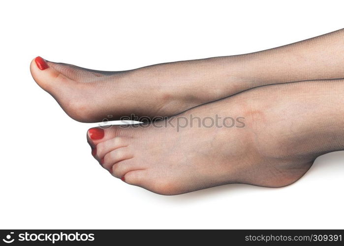 female feet in stockings on a white background