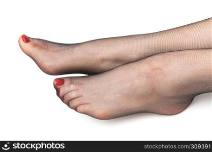 female feet in stockings on a white background