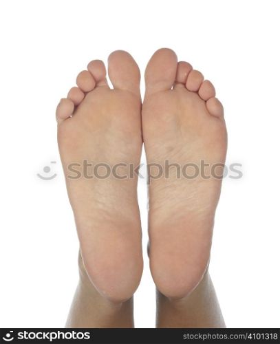 Female feet on a white background