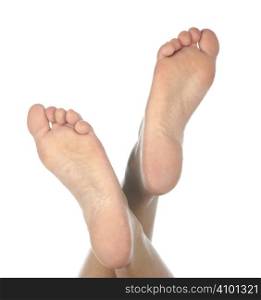 Female feet on a white background
