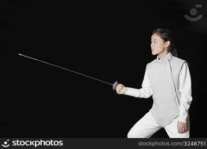Female fencer holding a fencing foil