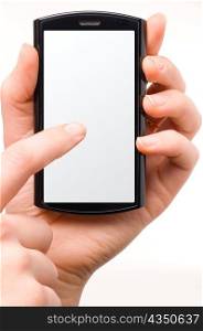 female finger is touching a modern black mobile phone