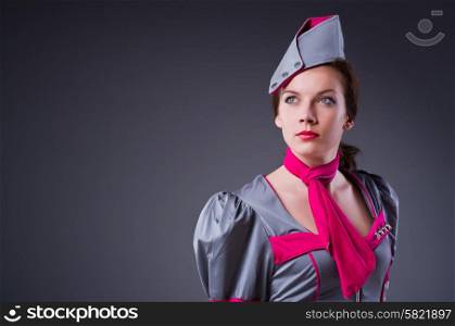 Female flight attendant in studio