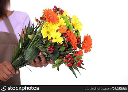 female florist taking a flowers bouquet