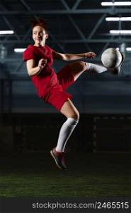 female football player kicking ball 4