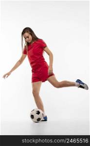 female football player kicking ball 5