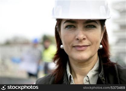 Female foreman running construction site