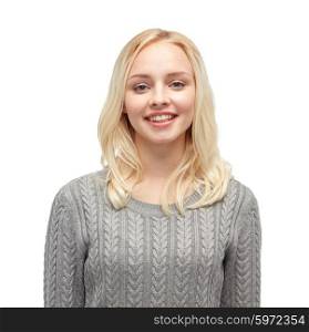 female, gender, fashion, portrait and people concept - smiling young woman or teenage girl in gray pullover