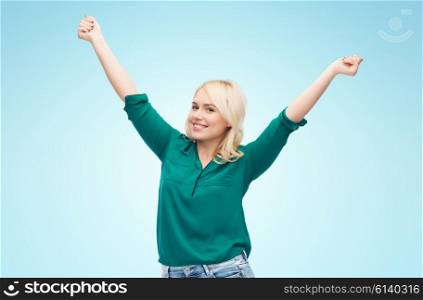 female, gender, joy, plus size and people concept - happy young woman in shirt and jeans over blue background