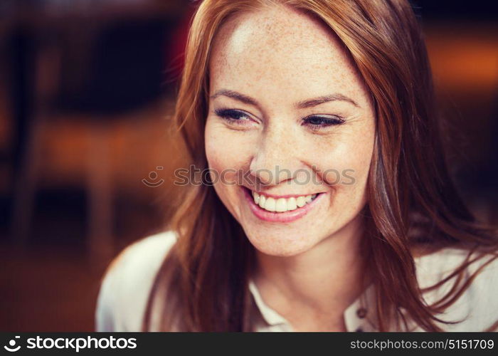 female, gender, portrait and people concept - smiling happy young redhead woman face. smiling happy young redhead woman face