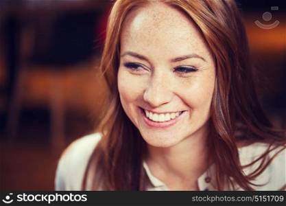 female, gender, portrait and people concept - smiling happy young redhead woman face. smiling happy young redhead woman face