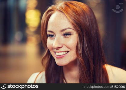 female, gender, portrait and people concept - smiling happy young redhead woman face. smiling happy young redhead woman face