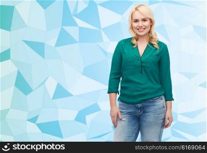 female, gender, portrait, plus size and people concept - smiling young woman in shirt and jeans over blue low poly background