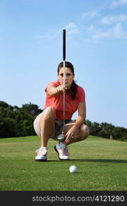 Female Golfer Concentrating