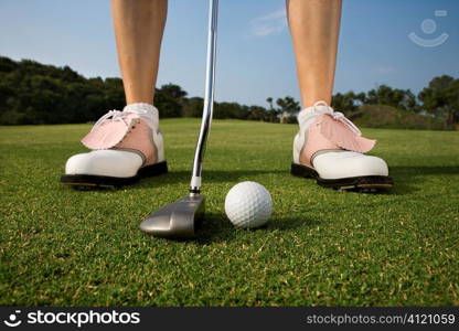 Female Golfer Putting