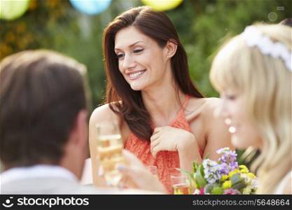Female Guest At Wedding Reception