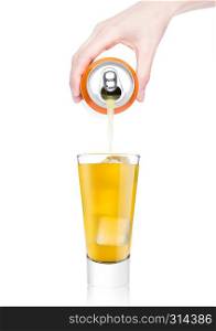 Female hand pouring orange soda drink from aluminium can to glass with ice cubes on white background