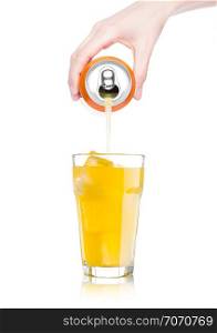 Female hand pouring orange soda drink from aluminium can to glass with ice cubes on white background