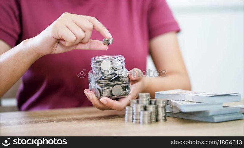 Female hand stack coins growing business. Saving money financial or loan for prepare in future financial insurance