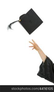 Female hand throwing up graduation cap