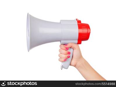 Female hand with pink nails holding a megaphone isolated on a white background