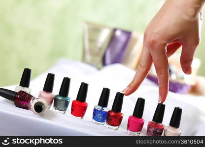 Female hands and manicure related objects in spa salon