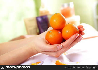 Female hands and manicure related objects in spa salon