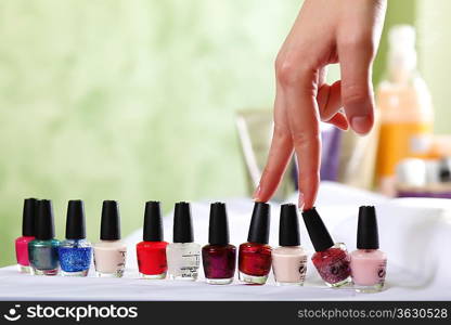 Female hands and manicure related objects in spa salon