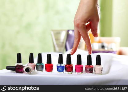 Female hands and manicure related objects in spa salon