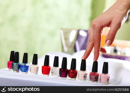 Female hands and manicure related objects in spa salon