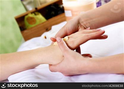 Female hands and manicure related objects in spa salon
