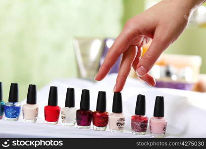 Female hands and manicure related objects in spa salon