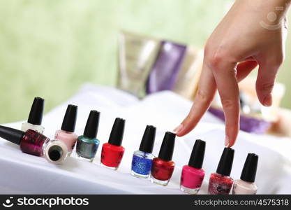 Female hands and manicure related objects in spa salon