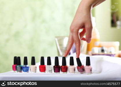 Female hands and manicure related objects in spa salon