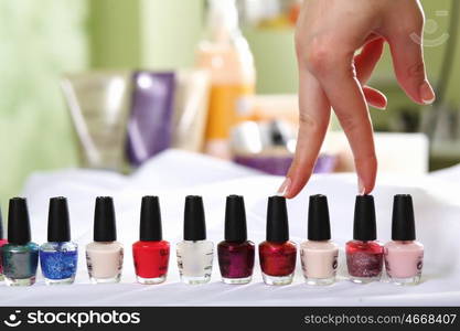 Female hands and manicure related objects in spa salon