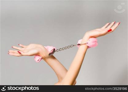 Female hands in handcuffs