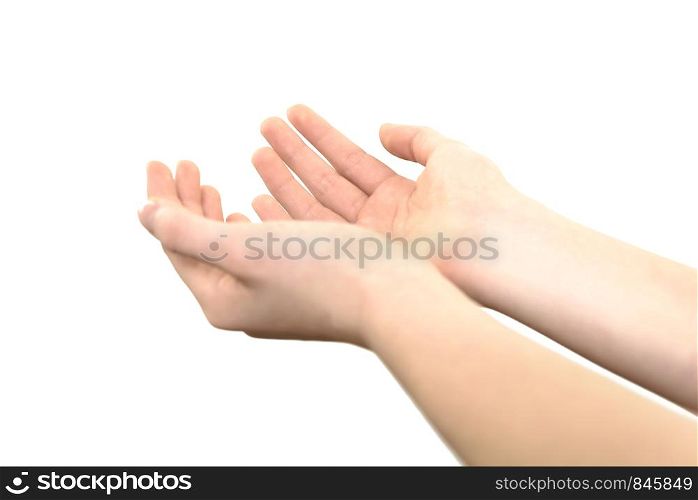 Female hands raised up in a gesture of holding something or praying on a white background in close-up