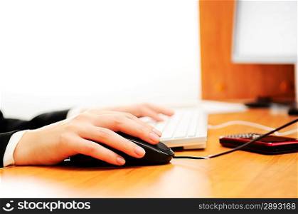 Female hands typing on a keyboard