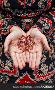 female hands with mehndi