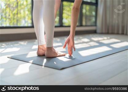 Female happiness Attractive young asian woman doing yoga stretching exercise on mat yoga & fitness exercises. Healthy lifestyle Calmness and relax at home
