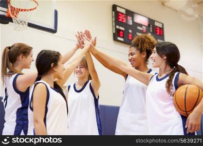 Female High School Basketball Team Having Team Talk