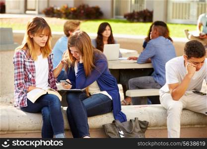 Female High School Student Comforting Unhappy Friend