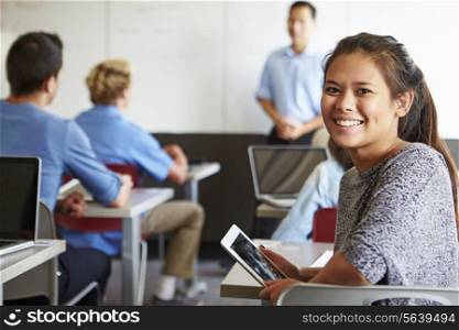 Female High School Student Digital Tablet In Classroom
