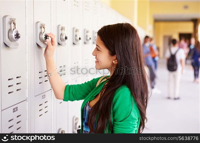 Female High School Student Opening Locker